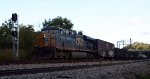 CSX train L214 heads west past the signal controlling movement eastbound from #1 track to the "Switching Lead".